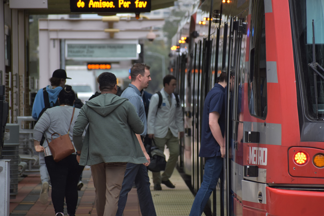 Commuters and Metro Train in Houston
